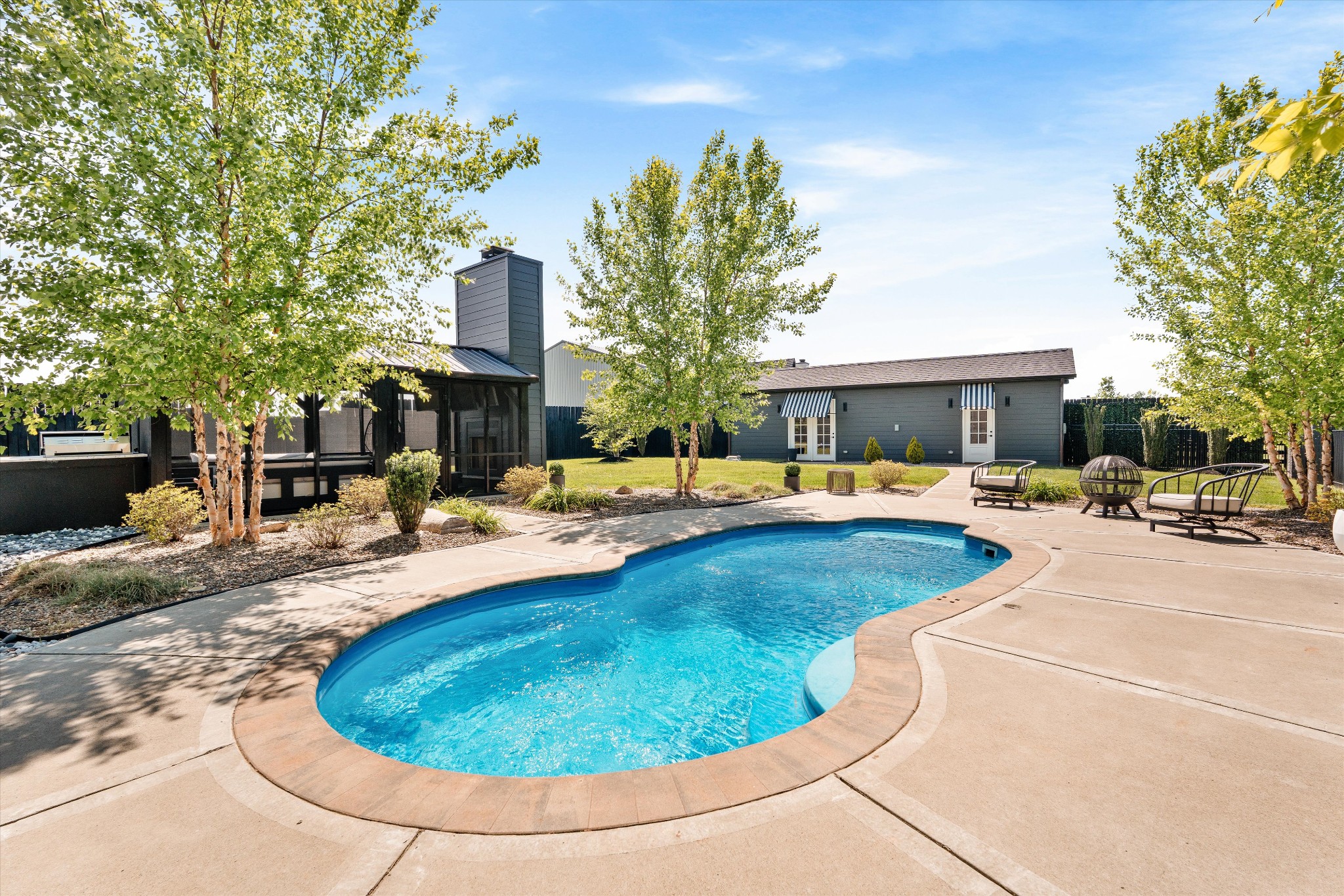 4546 Cedar Grove Road Murfreesboro, TN 37127 - Photo 82 of 86 a view of a swimming pool with a lounge chairs