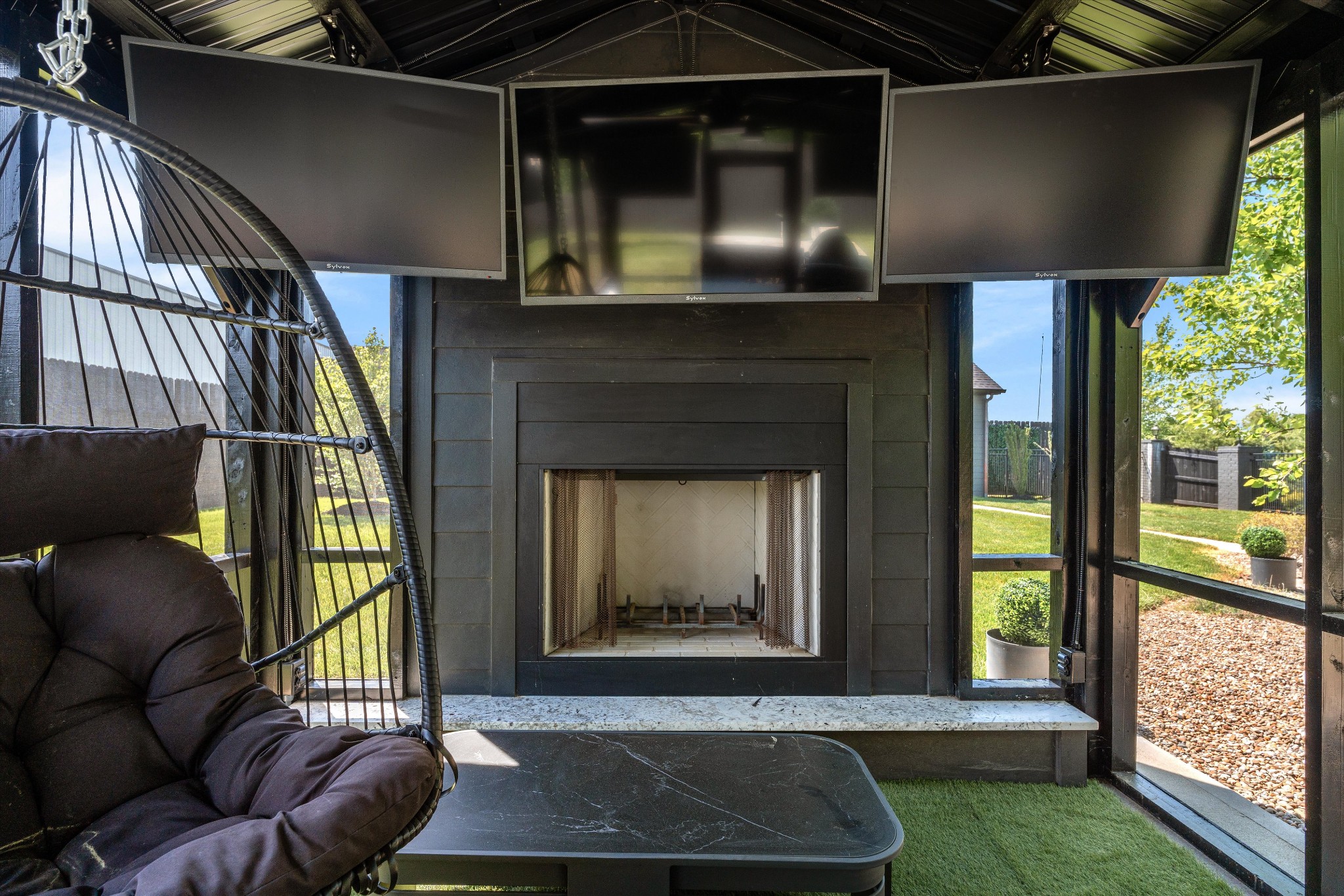 4546 Cedar Grove Road Murfreesboro, TN 37127 - Photo 85 of 86 a living room with a couch a fireplace and a large window