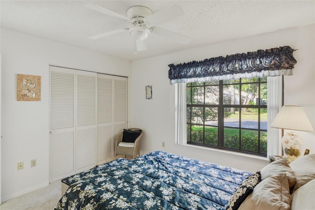 6606 Brambleleaf Drive Spring Hill, FL 34606 - Photo 18 of 79 a bedroom with a bed and a window