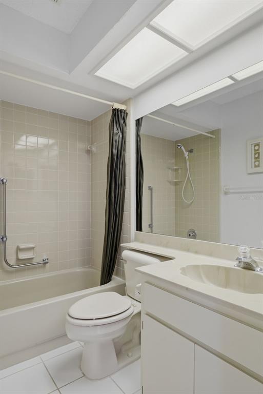 6606 Brambleleaf Drive Spring Hill, FL 34606 - Photo 20 of 79 a bathroom with a sink a toilet and a bathtub