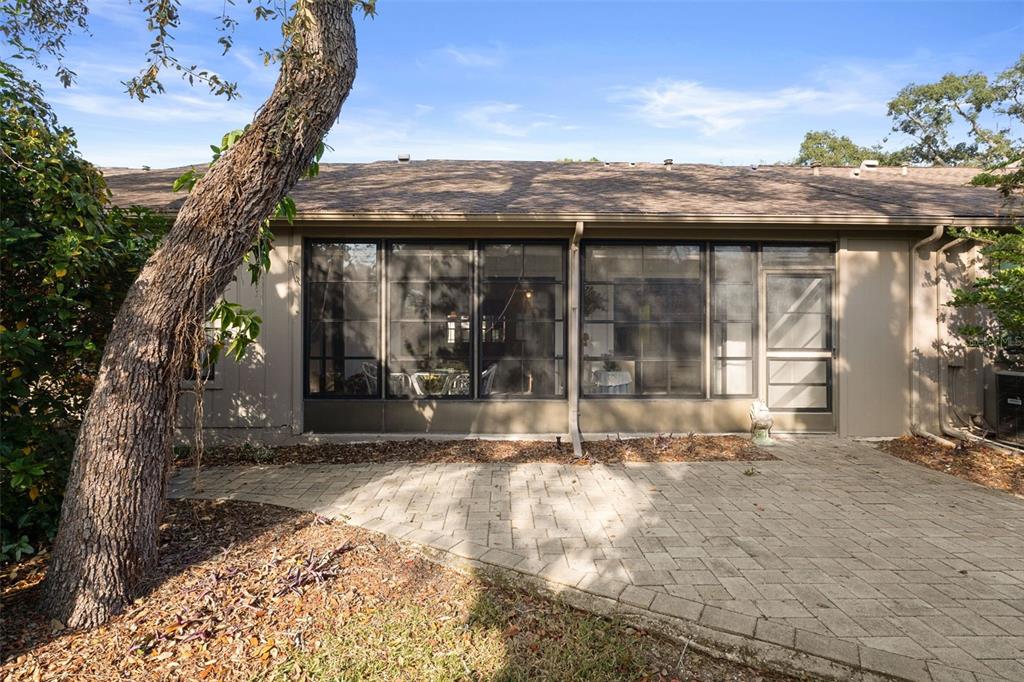 6606 Brambleleaf Drive Spring Hill, FL 34606 - Photo 30 of 79 a view of a house with a porch