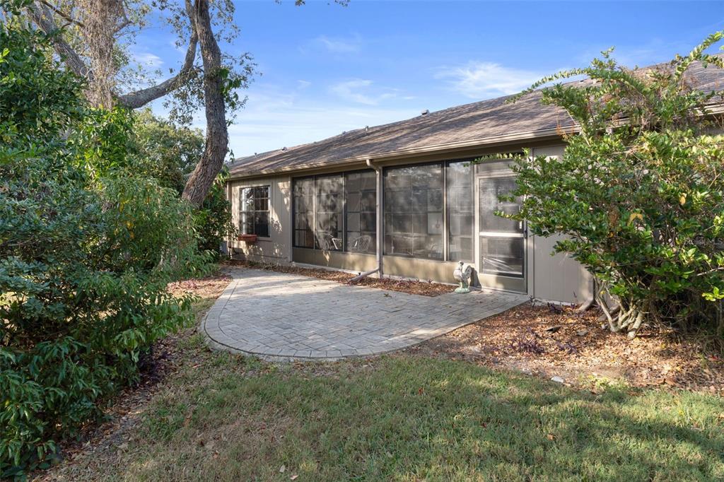6606 Brambleleaf Drive Spring Hill, FL 34606 - Photo 31 of 79 a view of a house with backyard and sitting area