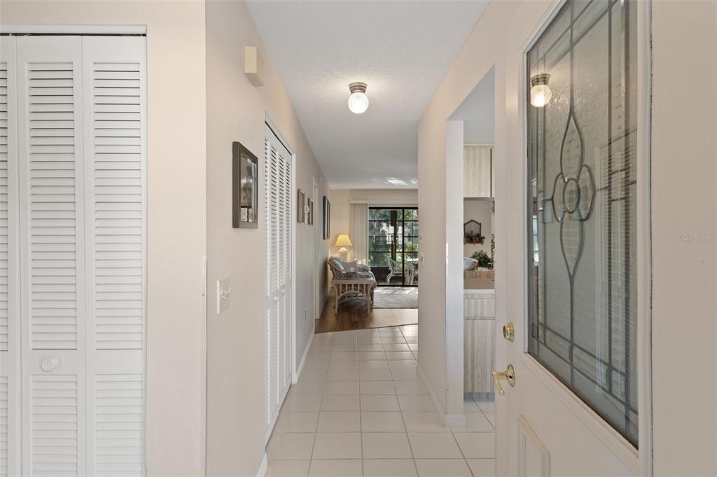6606 Brambleleaf Drive Spring Hill, FL 34606 - Photo 4 of 79 a view of a hallway with living room and dining room