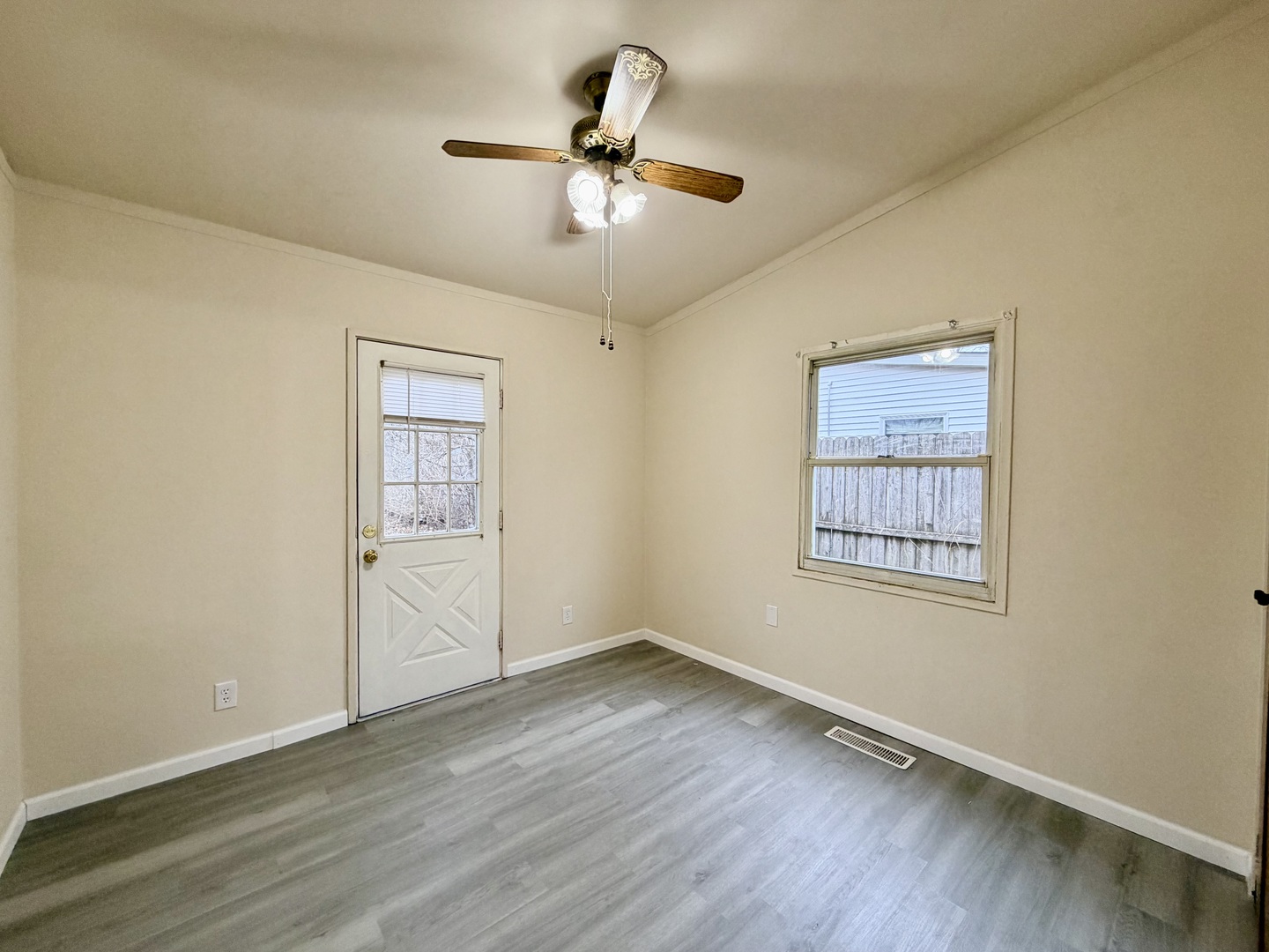 2016 Greendale Drive Champaign, IL 61821 - Photo 14 of 18 wooden floor in an empty room with a window