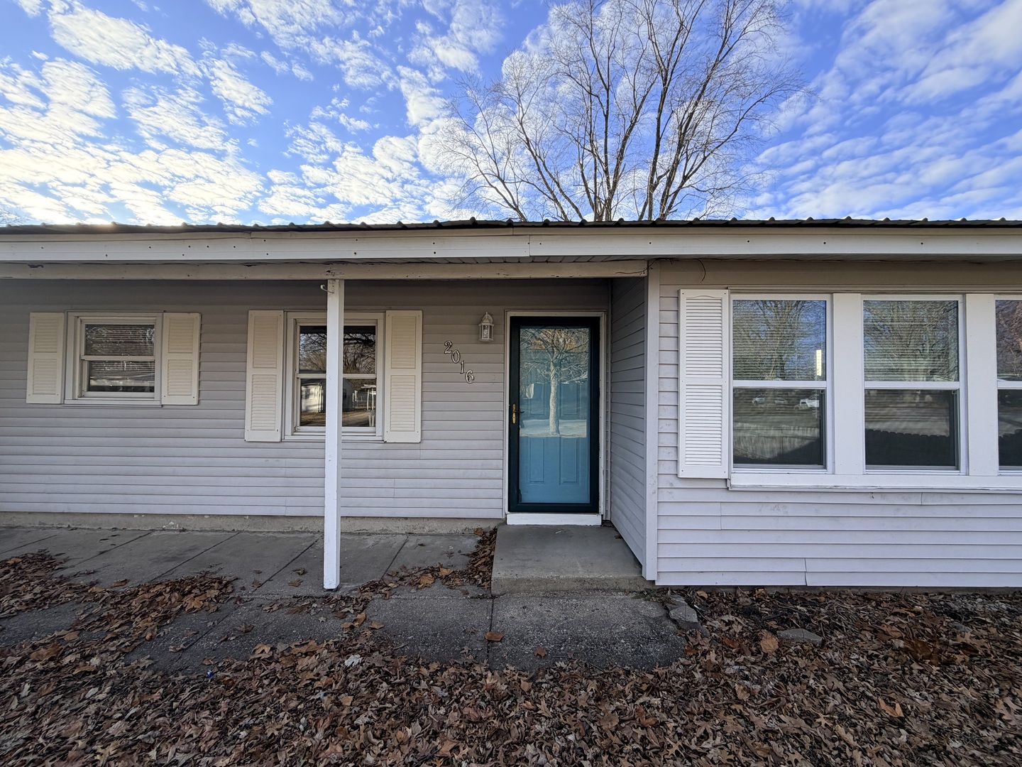 2016 Greendale Drive Champaign, IL 61821 - Photo 2 of 18 a house with a tree in the background