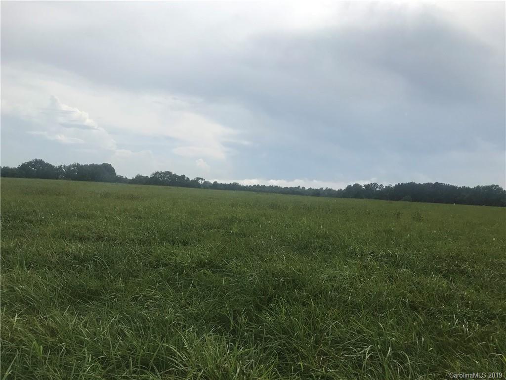 a view of a lake with a big yard