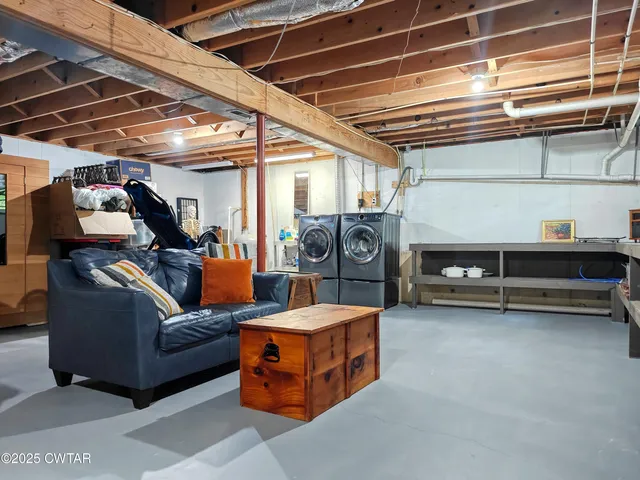 a living room with furniture and a table