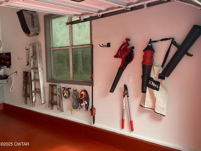 a view of front door with wooden floor