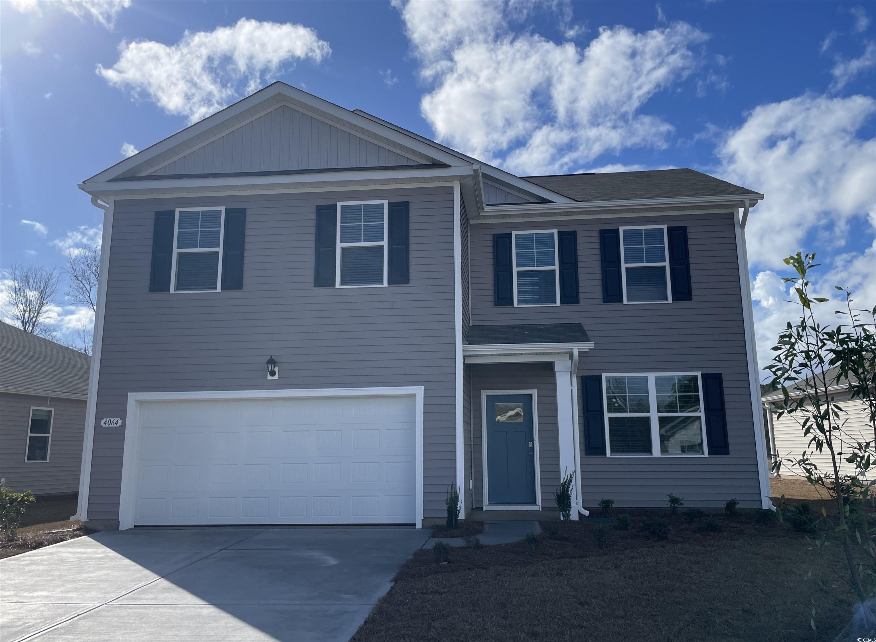 4064 Nelson Road Little River, SC 29566 - Photo 1 of 35 View of front of house featuring a garage
