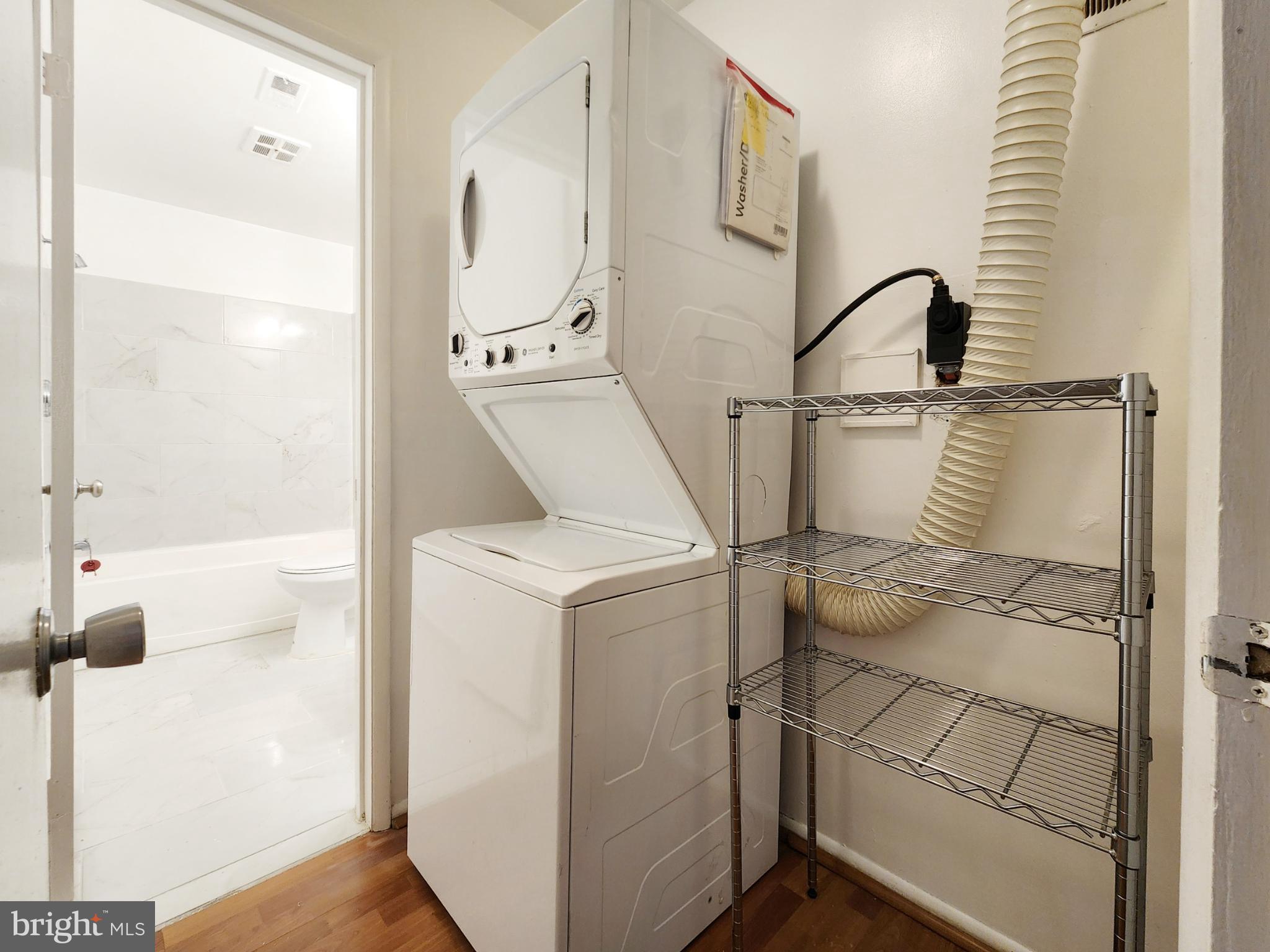 1710 Westwind Way McLean, VA 22102 - Photo 17 of 25 a utility room with dryer and washer