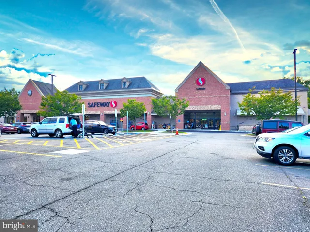 a view of a building with a yard
