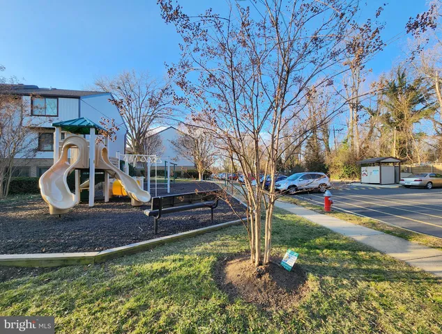 a car parked beside a road next to a road
