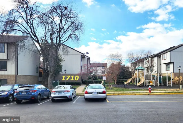 a car parked in front of a house