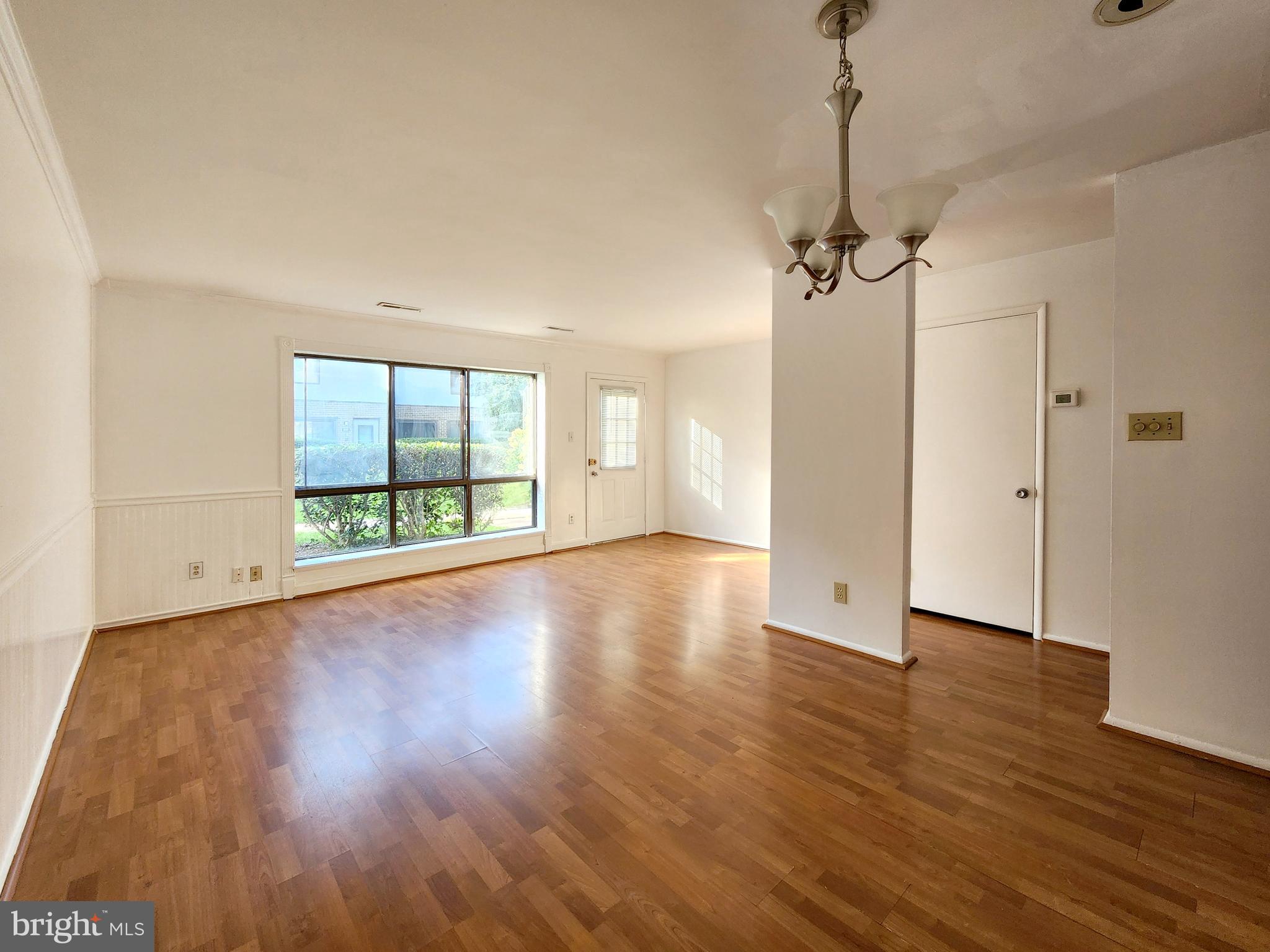 1710 Westwind Way McLean, VA 22102 - Photo 5 of 25 a view of empty room with wooden floor and fan