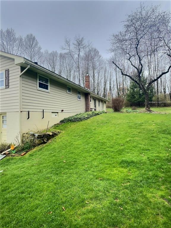 7749 Lamor Road Mercer, PA 16137 - Photo 15 of 17 a backyard of a house with lots of green space