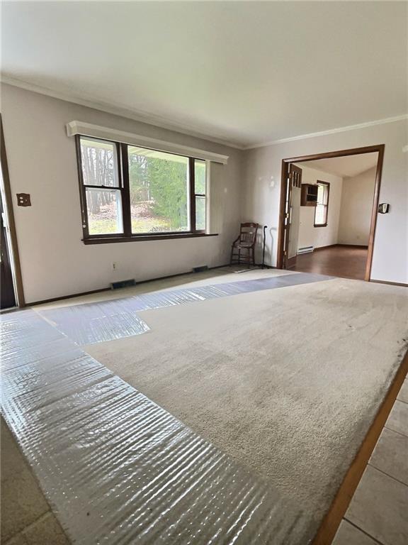 7749 Lamor Road Mercer, PA 16137 - Photo 2 of 17 a large bedroom with a bed and a large window
