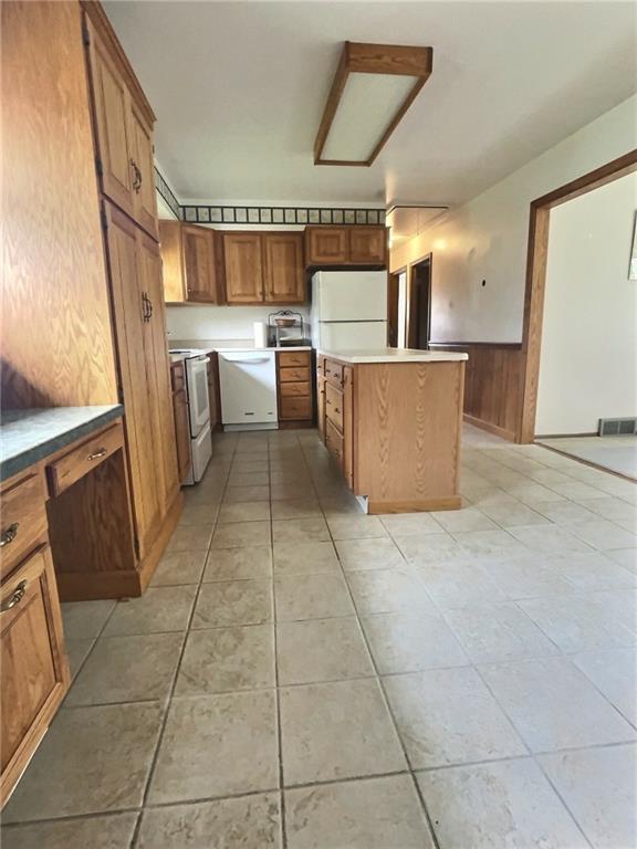 7749 Lamor Road Mercer, PA 16137 - Photo 6 of 17 a kitchen with granite countertop a sink a counter top space and cabinets