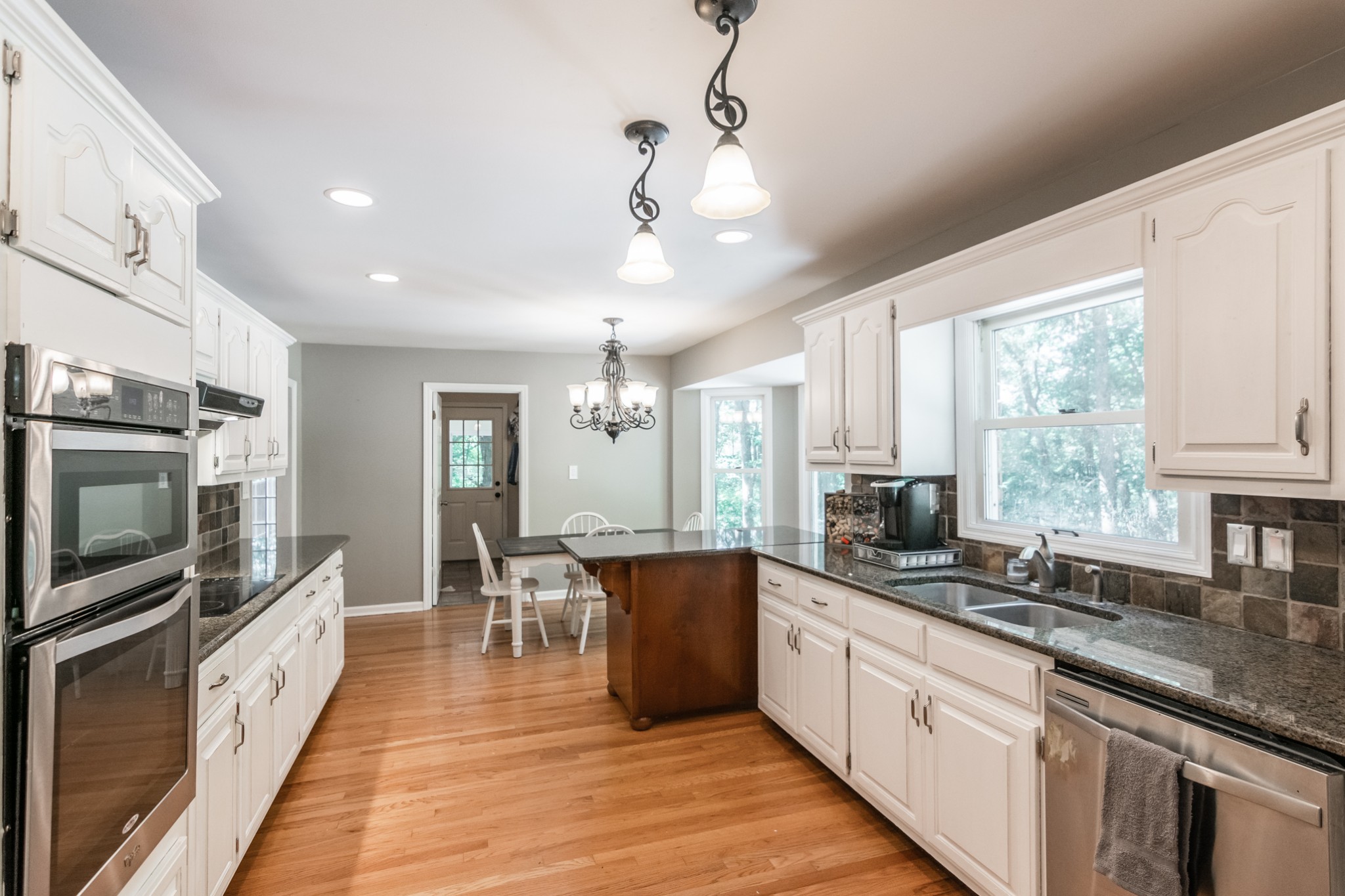 5207 Stacy Springs Road Springfield, TN 37172 - Photo 11 of 30 a large kitchen with a large counter top appliances and cabinets