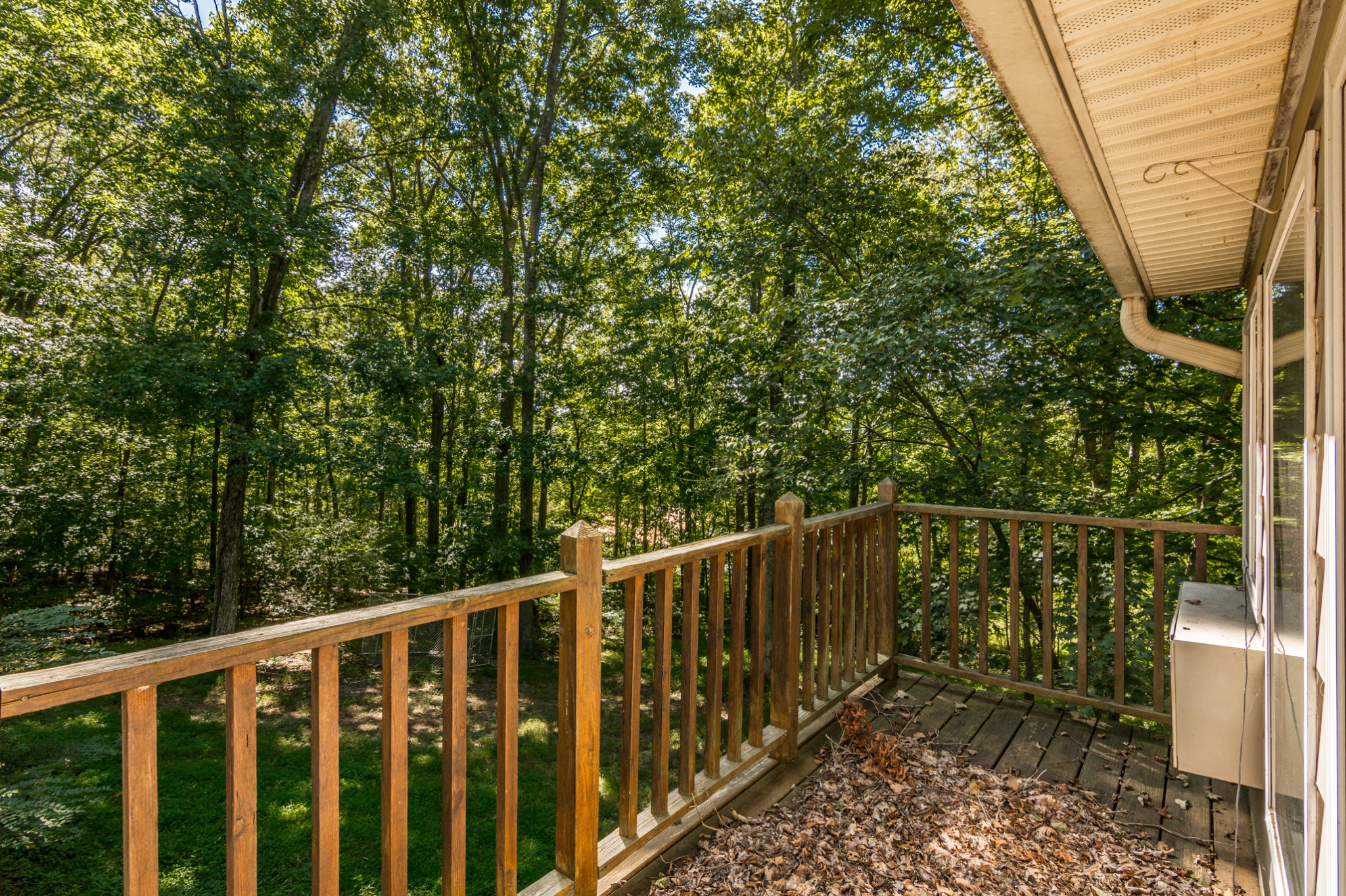 5207 Stacy Springs Road Springfield, TN 37172 - Photo 24 of 30 a balcony with wooden floor and fence