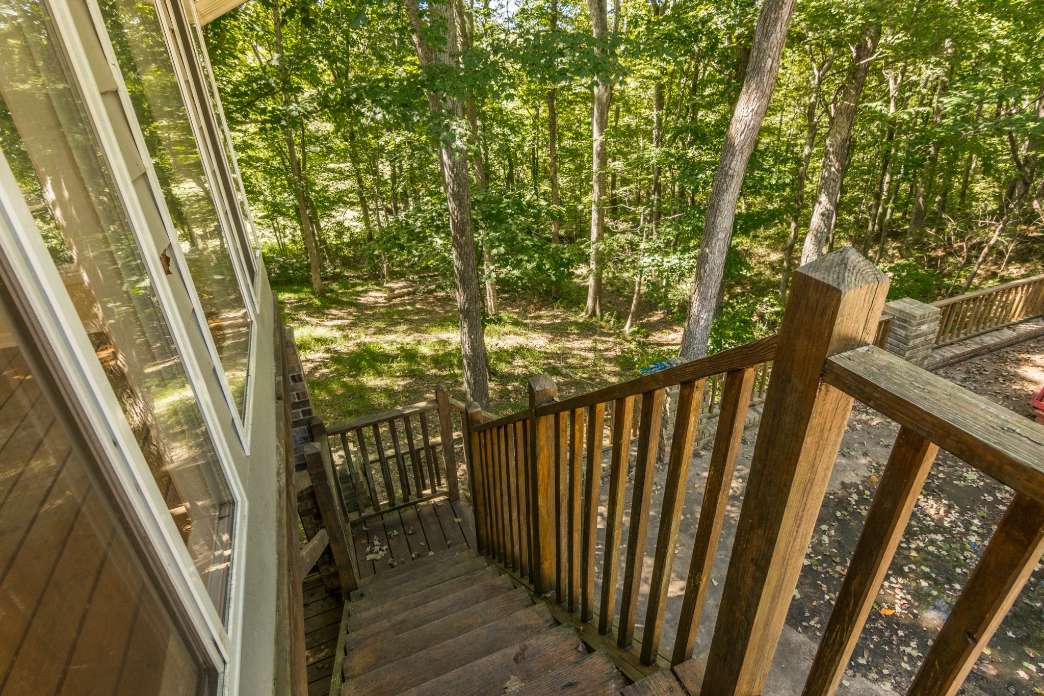 5207 Stacy Springs Road Springfield, TN 37172 - Photo 25 of 30 a view of balcony with wooden floor and fence