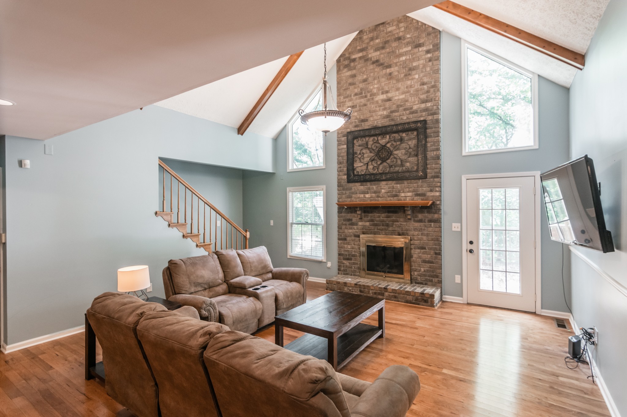 5207 Stacy Springs Road Springfield, TN 37172 - Photo 4 of 30 a living room with furniture fireplace and flat screen tv