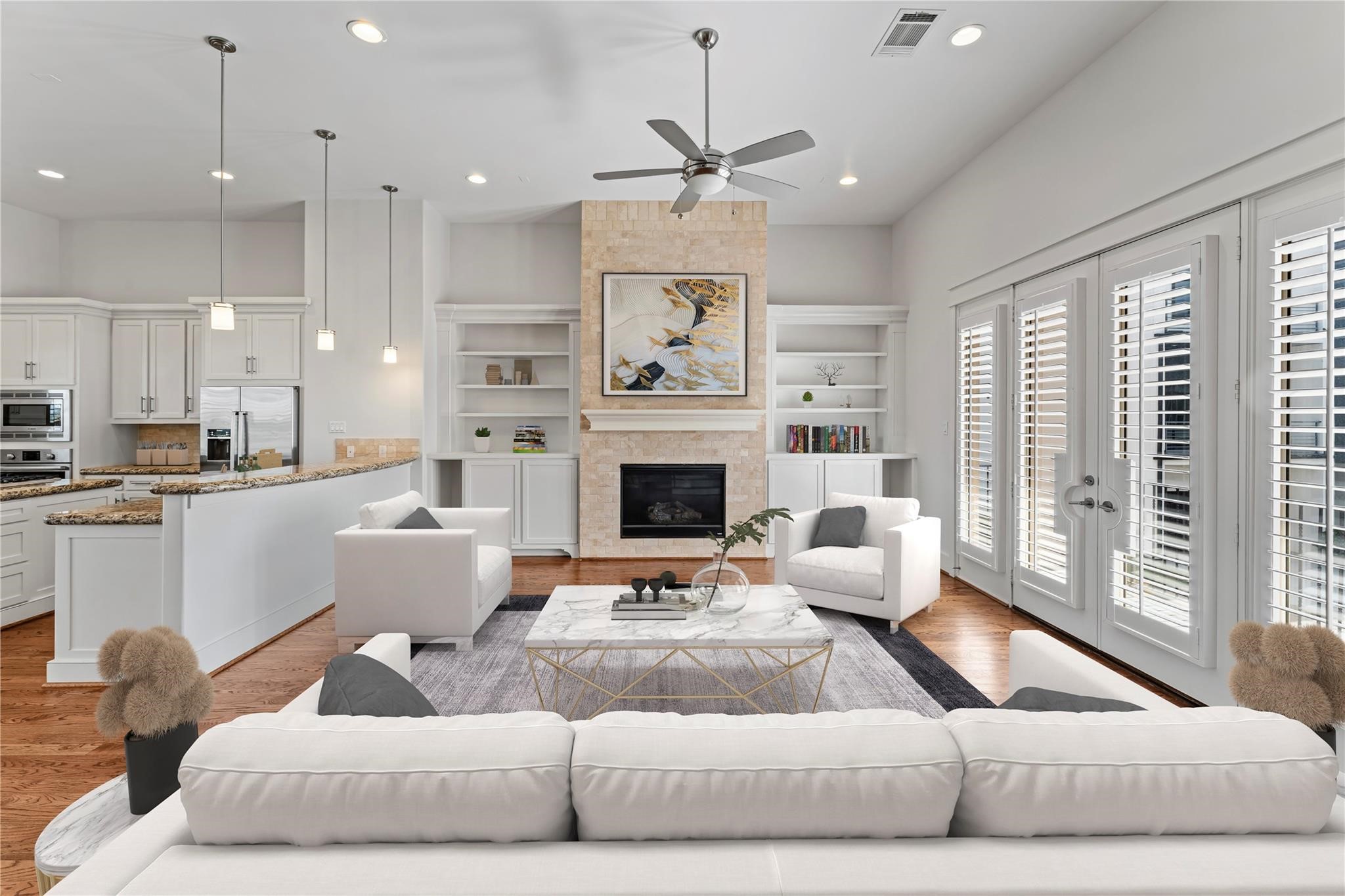 4938 Edison Park Lane Houston, TX 77081 - Photo 26 of 49 a living room with furniture kitchen view and a fireplace