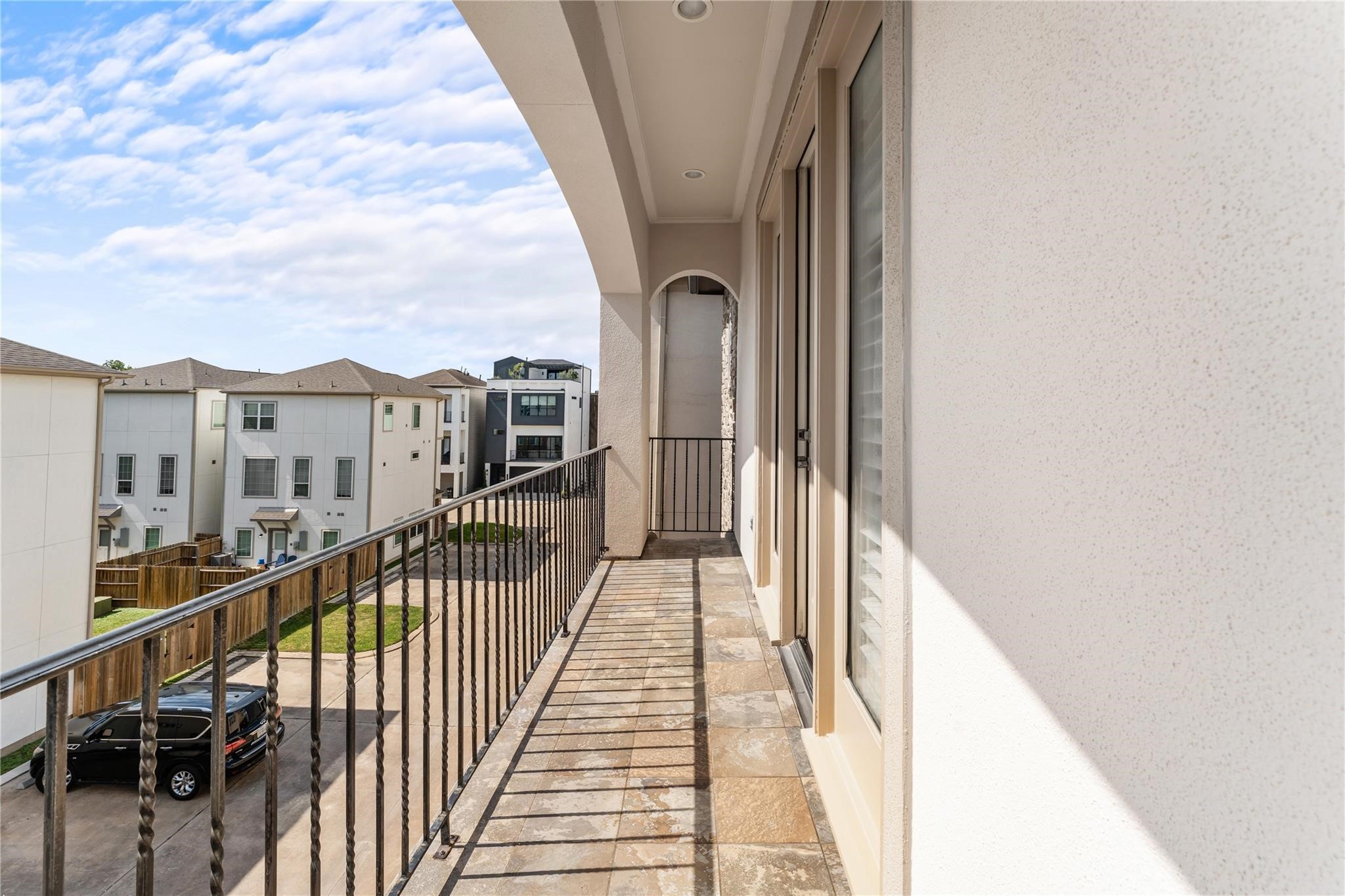 4938 Edison Park Lane Houston, TX 77081 - Photo 29 of 49 a view of balcony with a potted plant