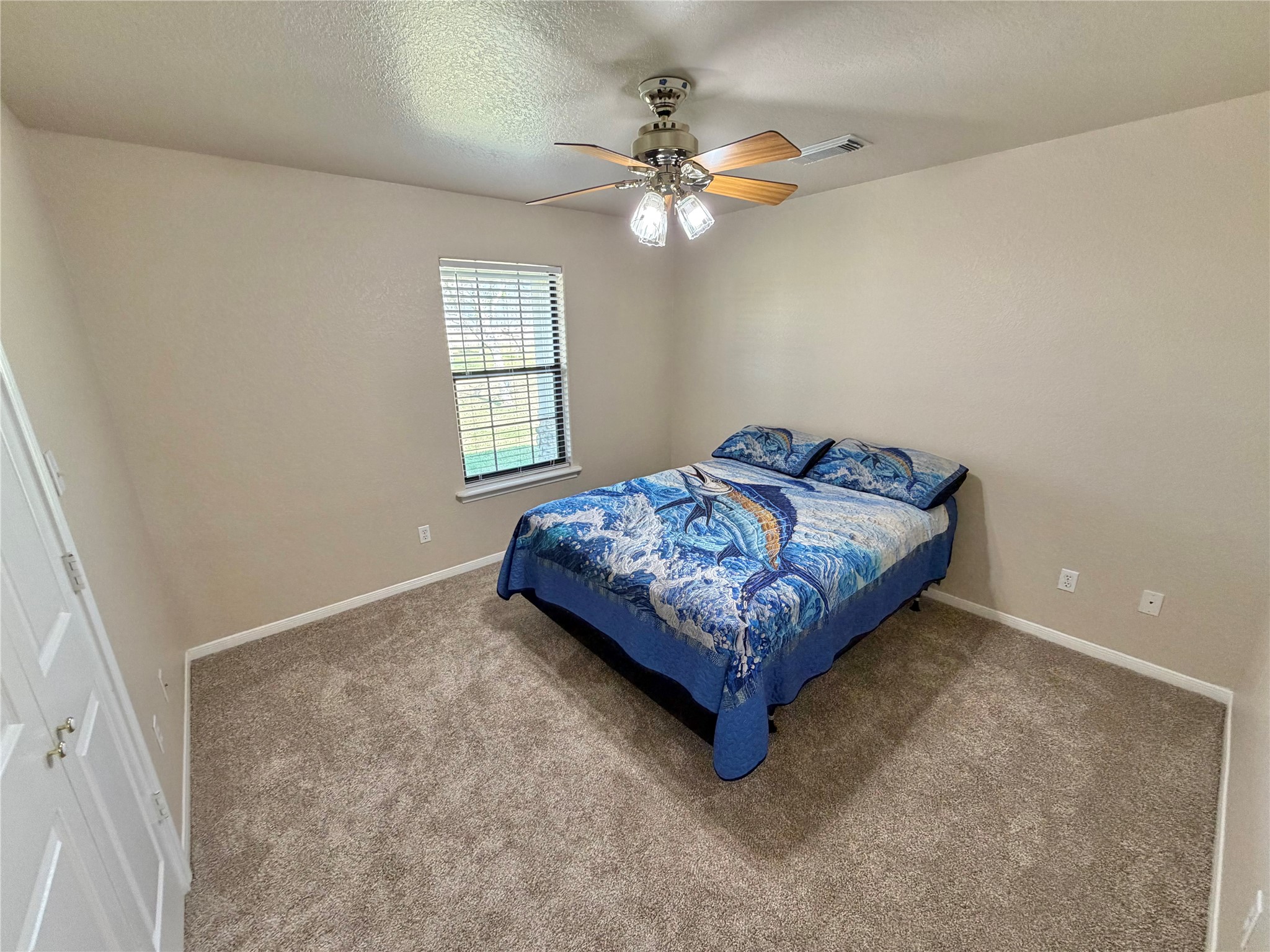 15903 County Road 621 Angleton, TX 77515 - Photo 24 of 33 a bedroom with a bed and window