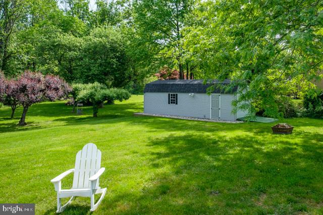 31 Bordentown Chesterfield Road Chesterfield, NJ 08515 - Photo 38 of 55 a view of a backyard with table and chairs and plants