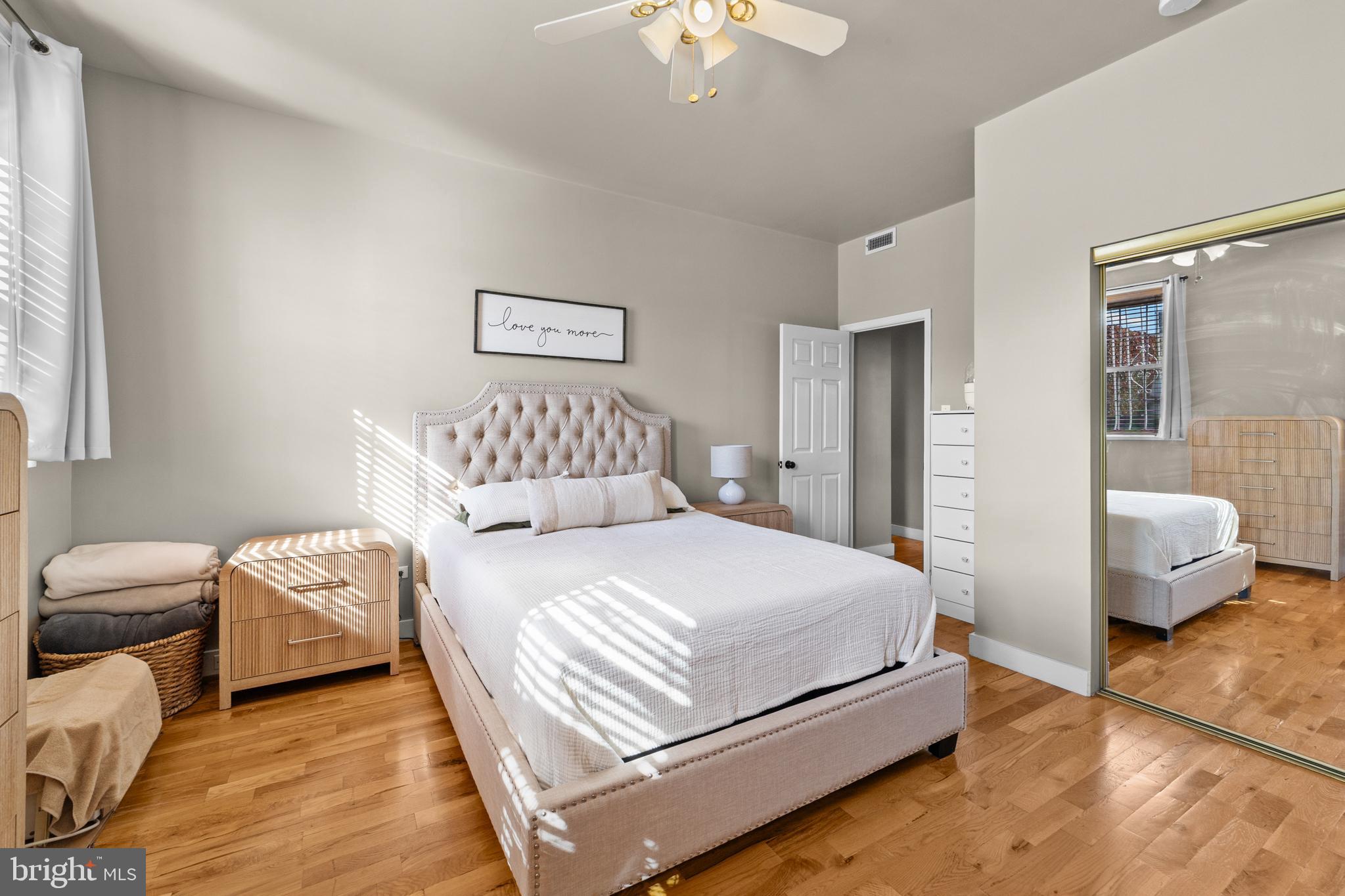 1642-44 Ridge Avenue Philadelphia, PA 19130 - Photo 15 of 24 a bedroom with a bed and a couch