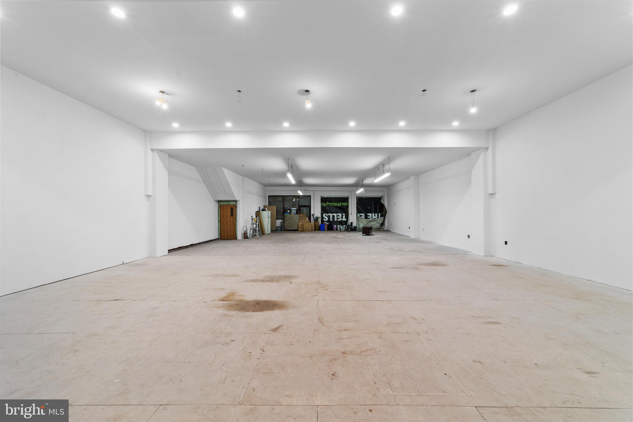 1642-44 Ridge Avenue Philadelphia, PA 19130 - Photo 21 of 24 a view of an empty room with kitchen and a window