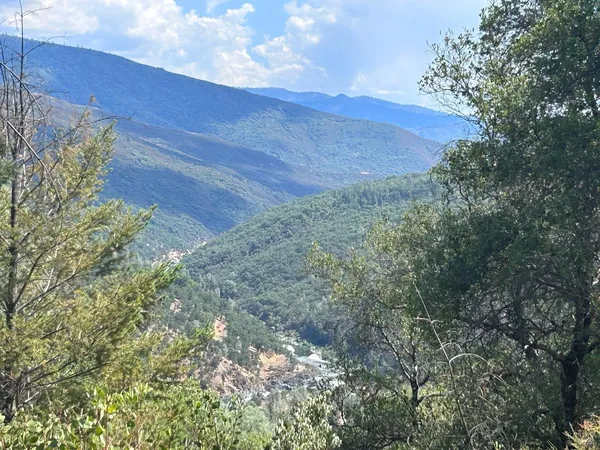 a view of a field with an outdoor space