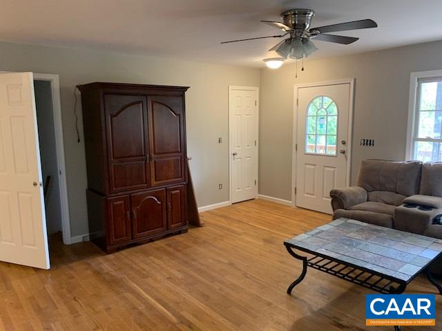 344 High Ridge Road Stanardsville, VA 22973 - Photo 5 of 9 a living room with furniture and a window