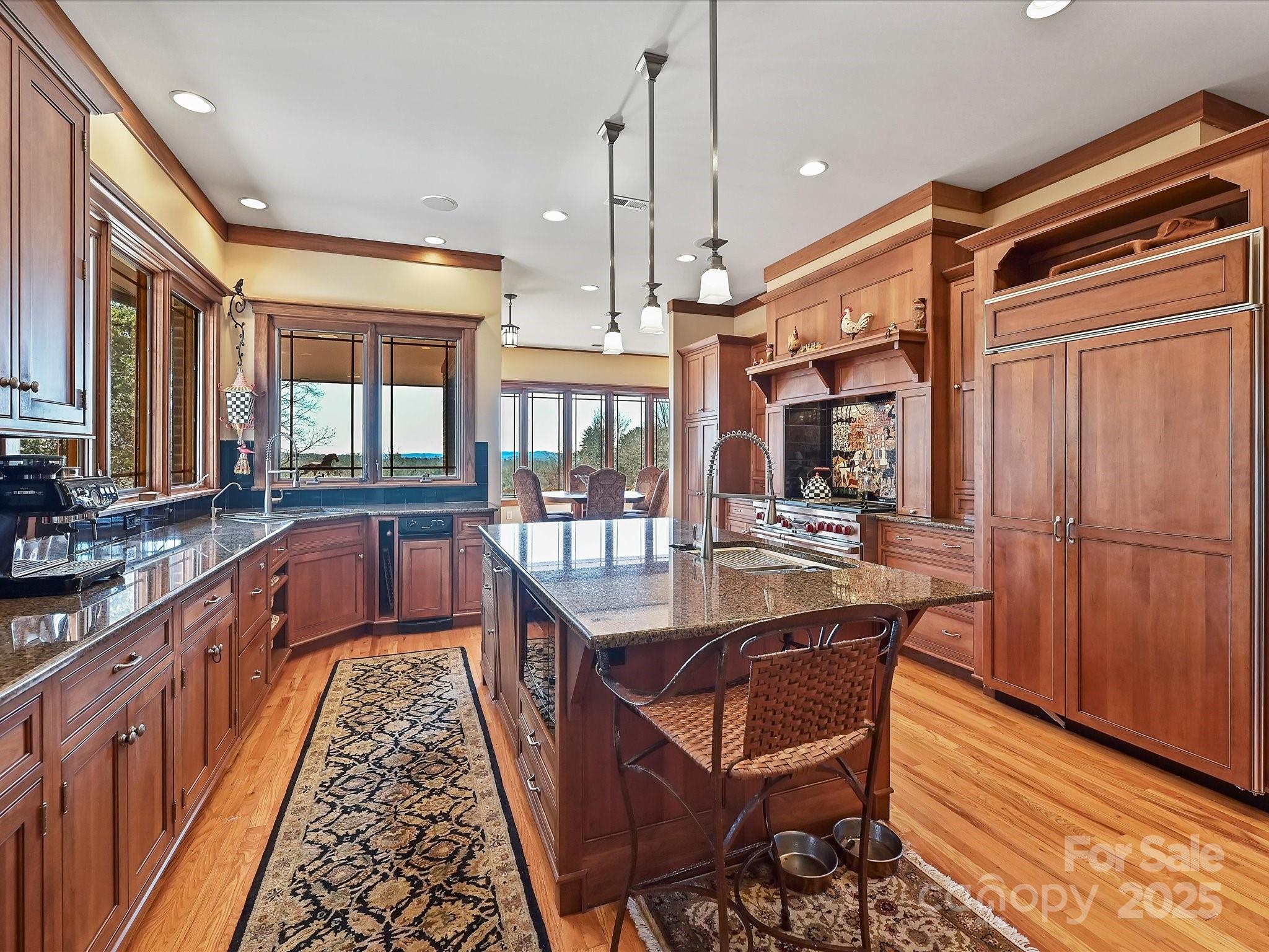 172 Tuckertown Road New London, NC 28127 - Photo 19 of 47 a dining table with chairs and wooden floor