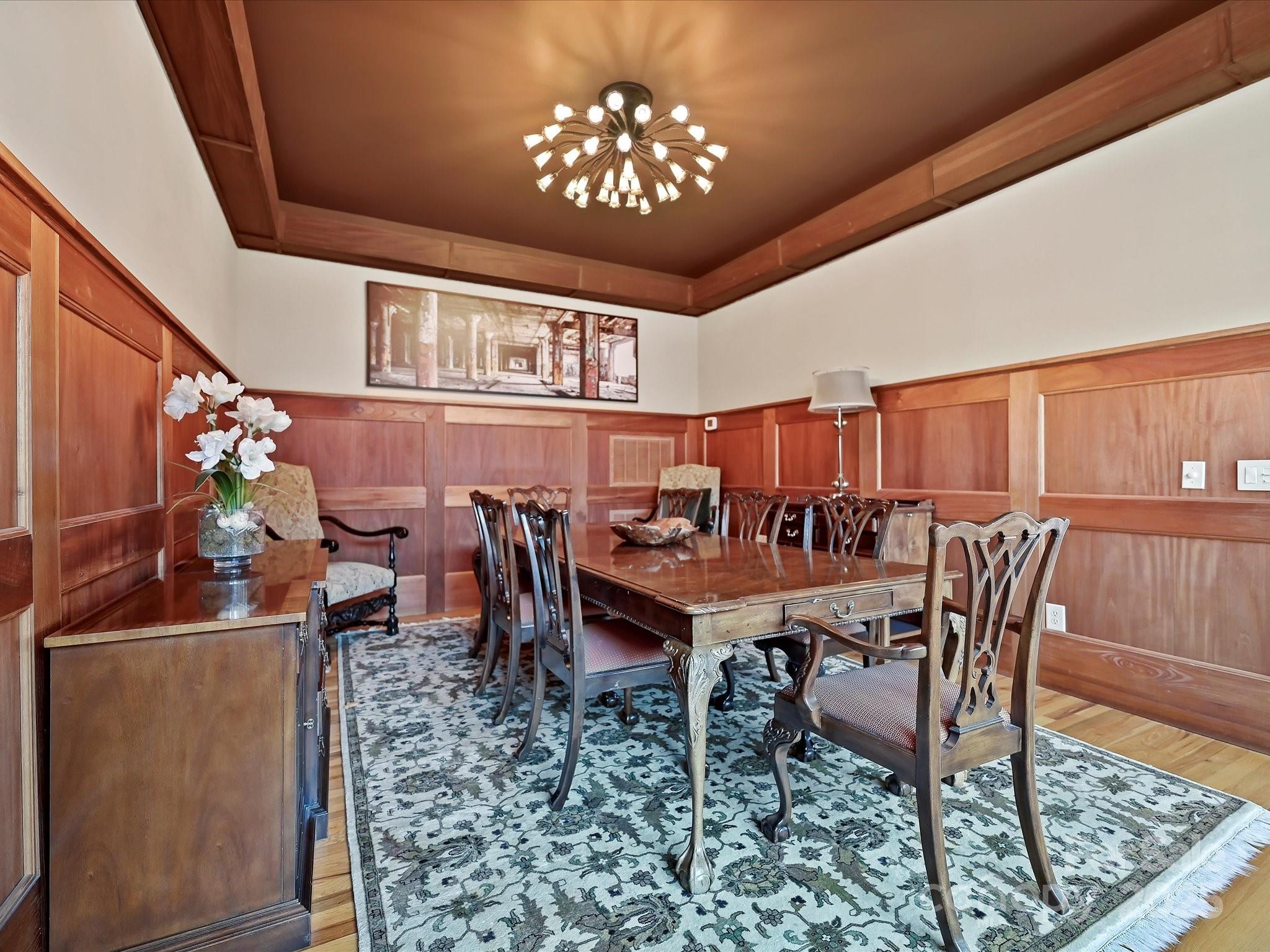 172 Tuckertown Road New London, NC 28127 - Photo 22 of 47 a view of a dining room with furniture and chandelier