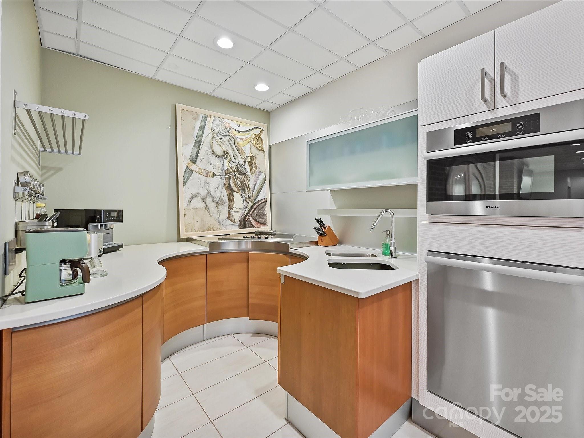 172 Tuckertown Road New London, NC 28127 - Photo 26 of 47 a kitchen with stainless steel appliances granite countertop a sink stove and refrigerator