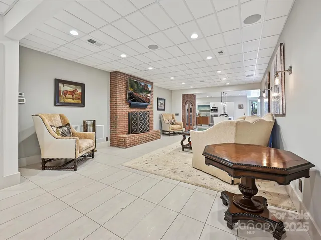 a view of a backyard with sitting area