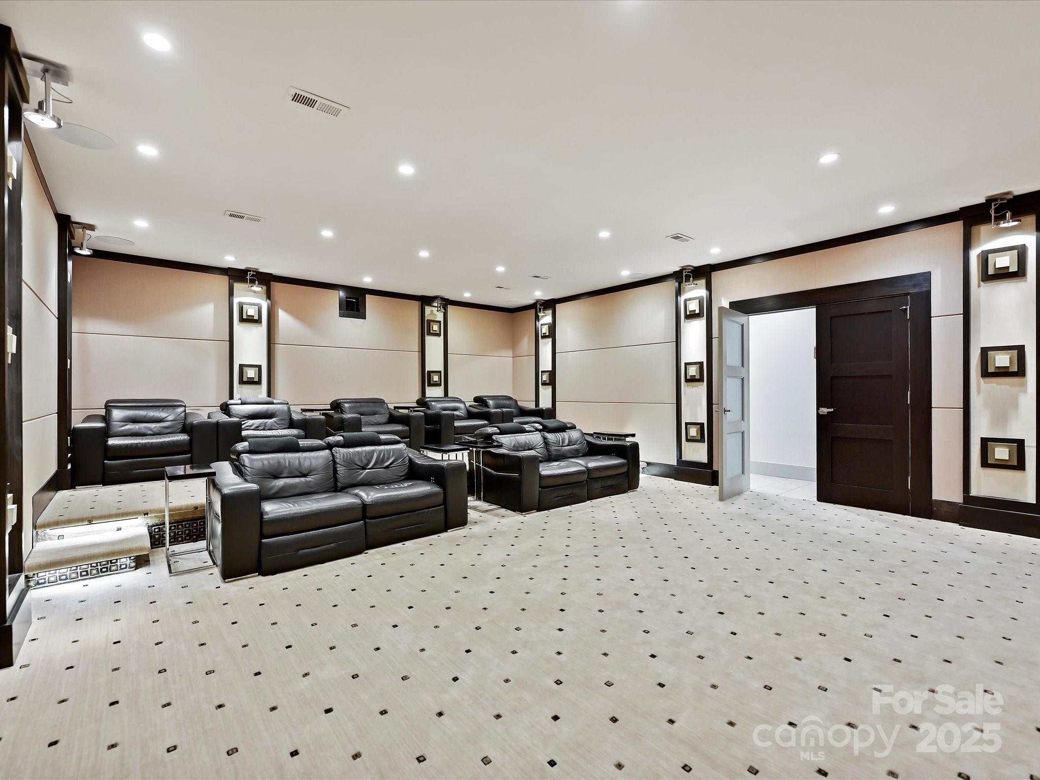 172 Tuckertown Road New London, NC 28127 - Photo 30 of 47 a large room with lots of chairs and a chandelier