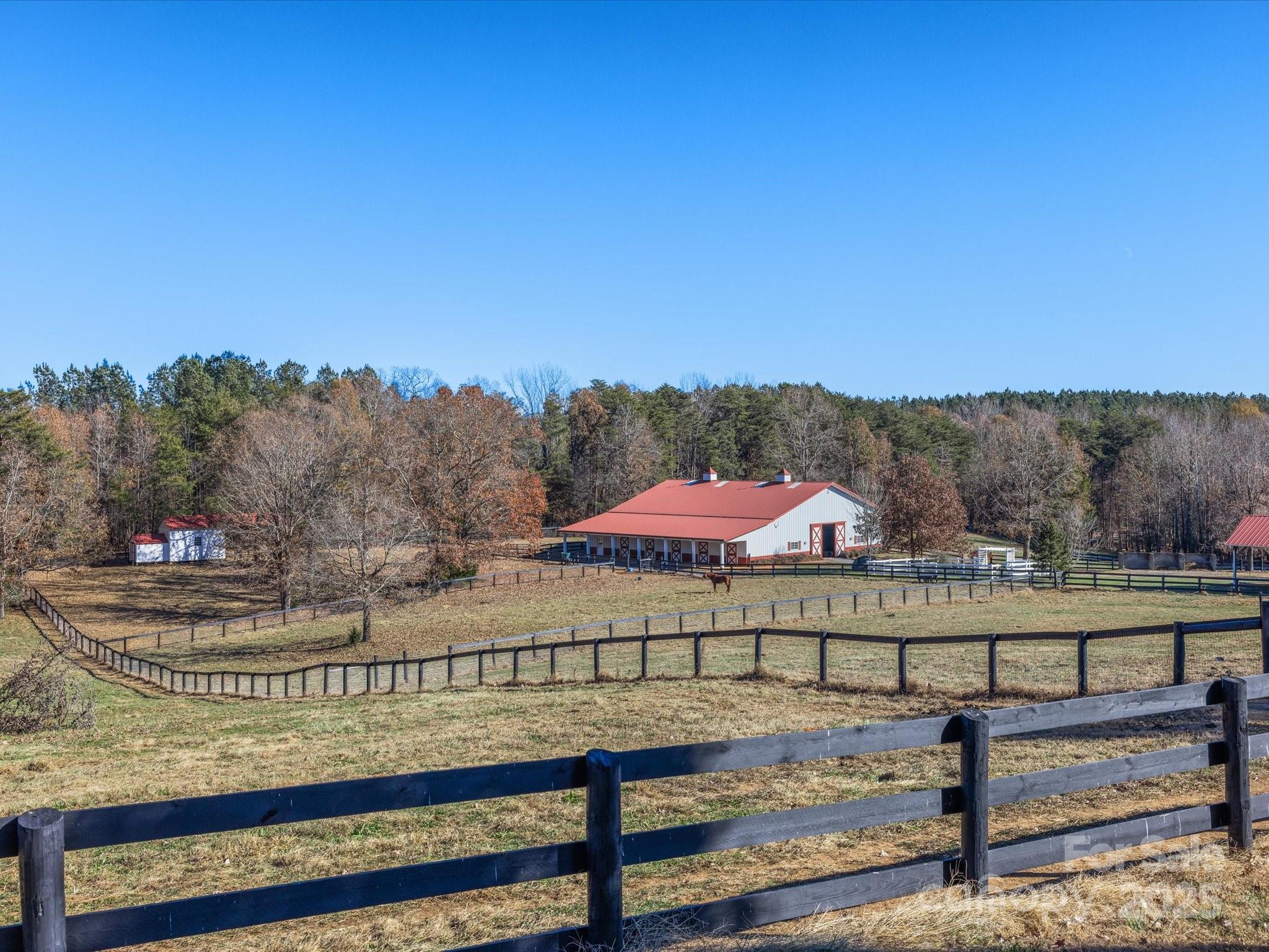 172 Tuckertown Road New London, NC 28127 - Photo 34 of 47 a view of a yard with an outdoor space