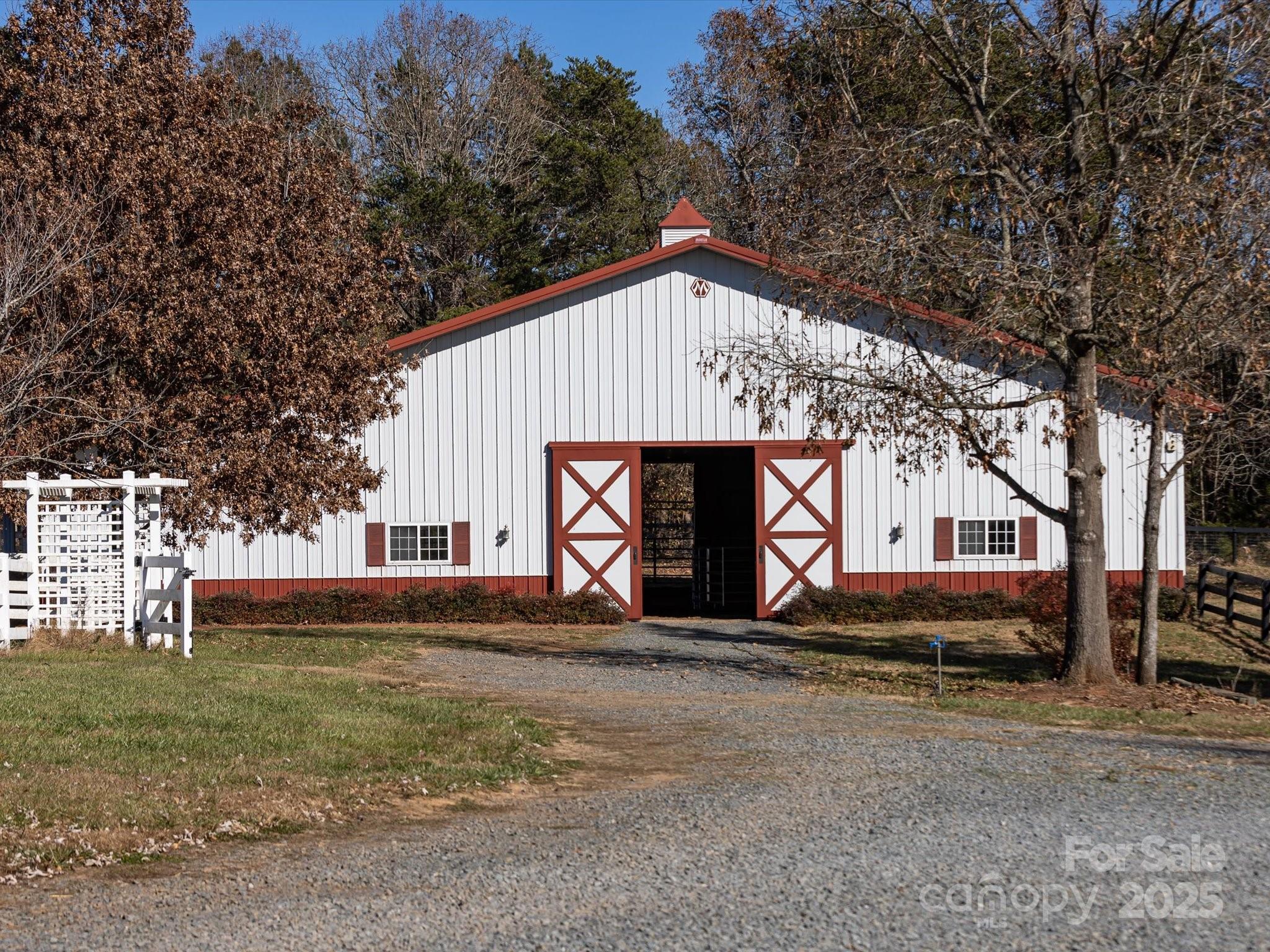 172 Tuckertown Road New London, NC 28127 - Photo 44 of 47 a front view of a house with garden