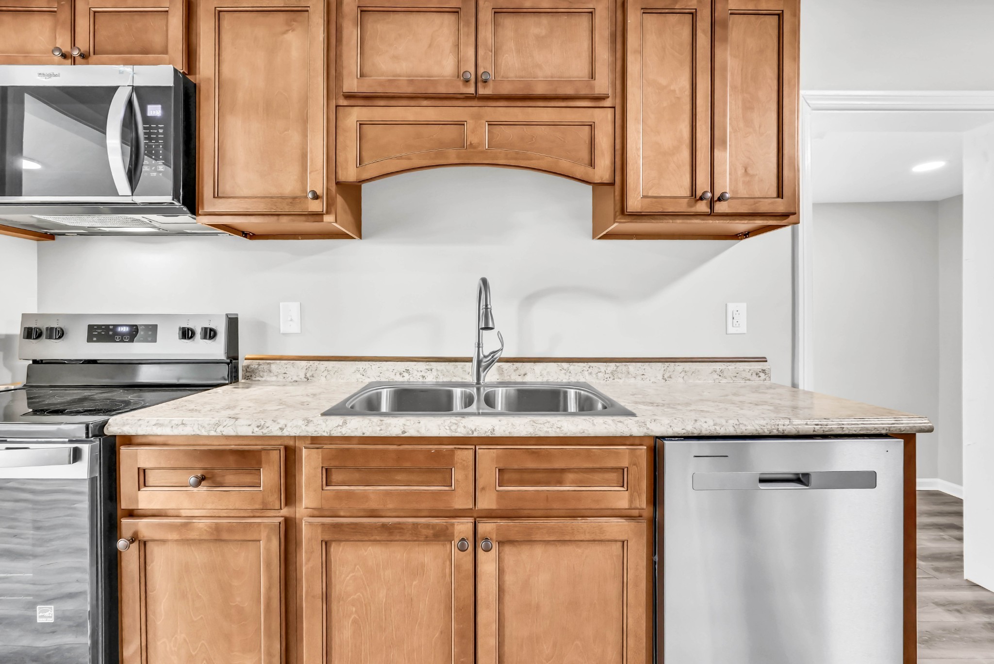 3436 State Highway 48 Cunningham, TN 37052 - Photo 19 of 45 a kitchen with stainless steel appliances granite countertop a sink and cabinets