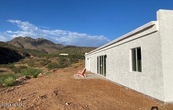 280 Circulo Cerro Rio Rico, AZ 85648 - Photo 32 of 38 a backyard of a house with a mountain view