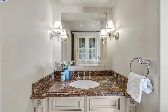 a bedroom with a large bed and a large window