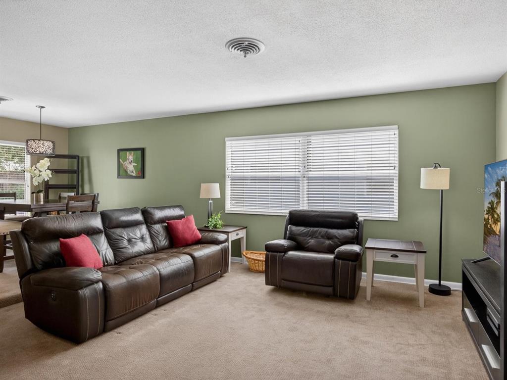 2803 Banchory Road Winter Park, FL 32792 - Photo 3 of 31 a living room with furniture and a window
