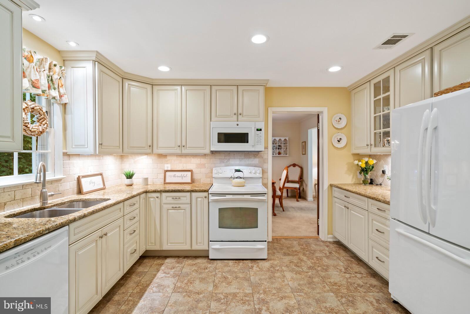 7788 Turlock Road Springfield, VA 22153 - Photo 12 of 65 Granite counter with double undermount sink