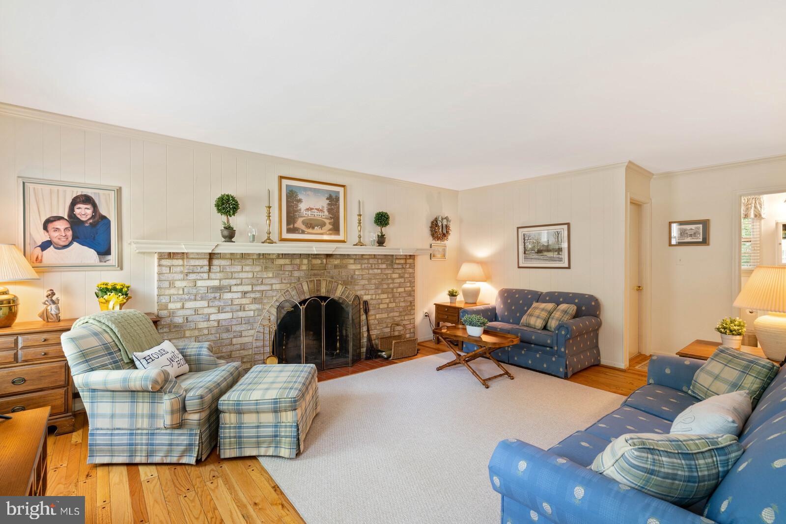 7788 Turlock Road Springfield, VA 22153 - Photo 18 of 65 Family room with brick fireplace and custom mantle