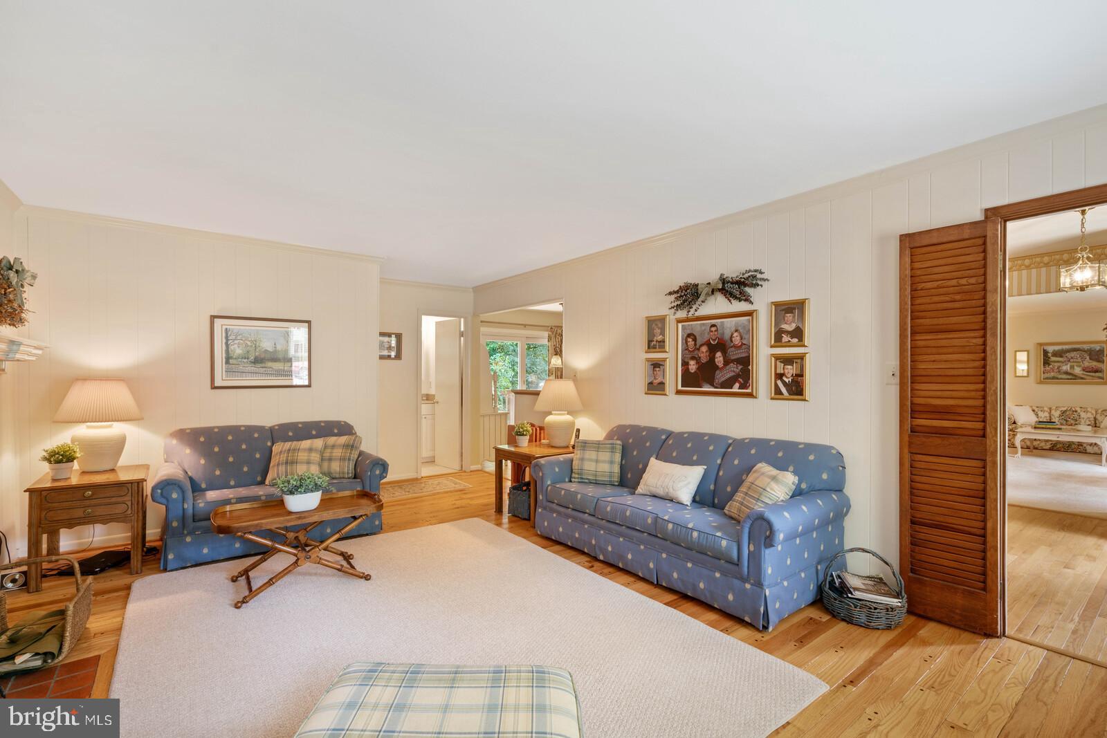 7788 Turlock Road Springfield, VA 22153 - Photo 20 of 65 Family room with gleaming wood floors