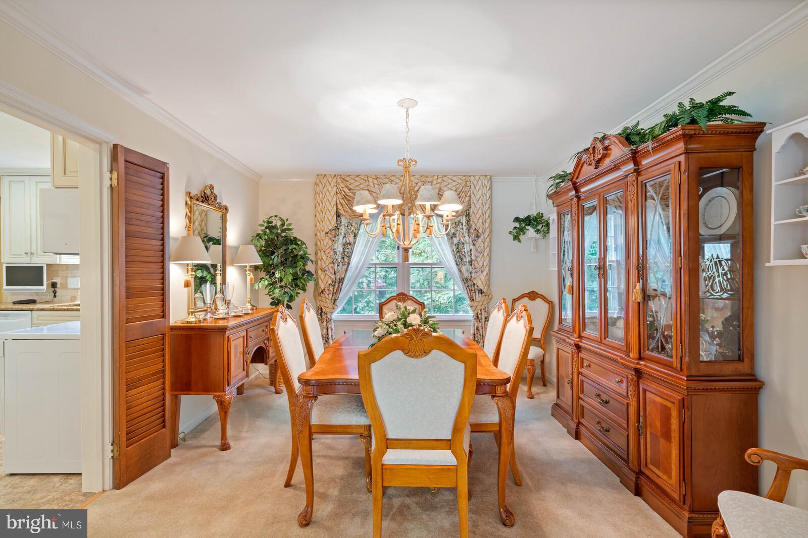 7788 Turlock Road Springfield, VA 22153 - Photo 28 of 65 Formal dining room with lovely chandelier