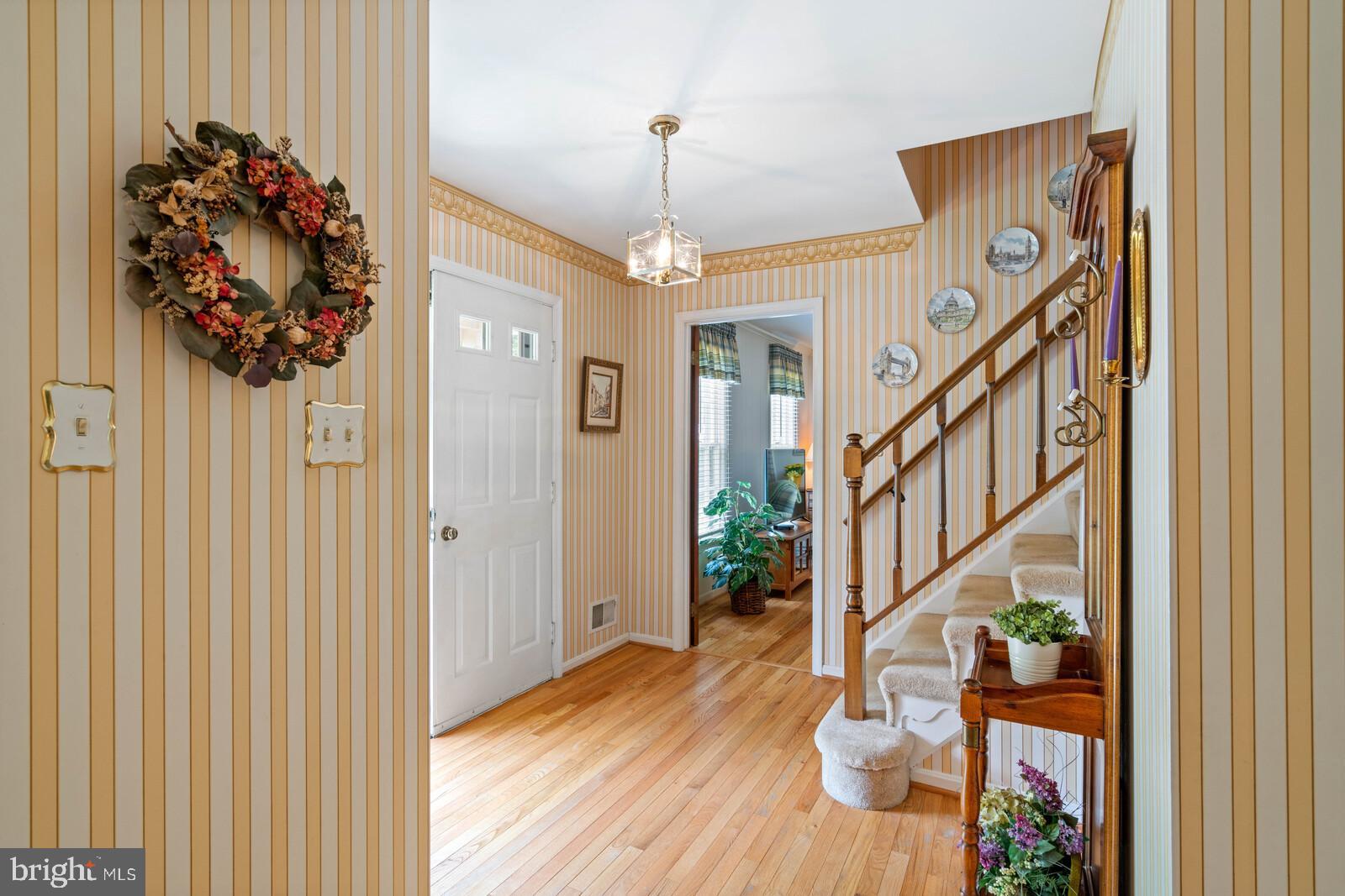 7788 Turlock Road Springfield, VA 22153 - Photo 34 of 65 Entrance foyer with wood floors