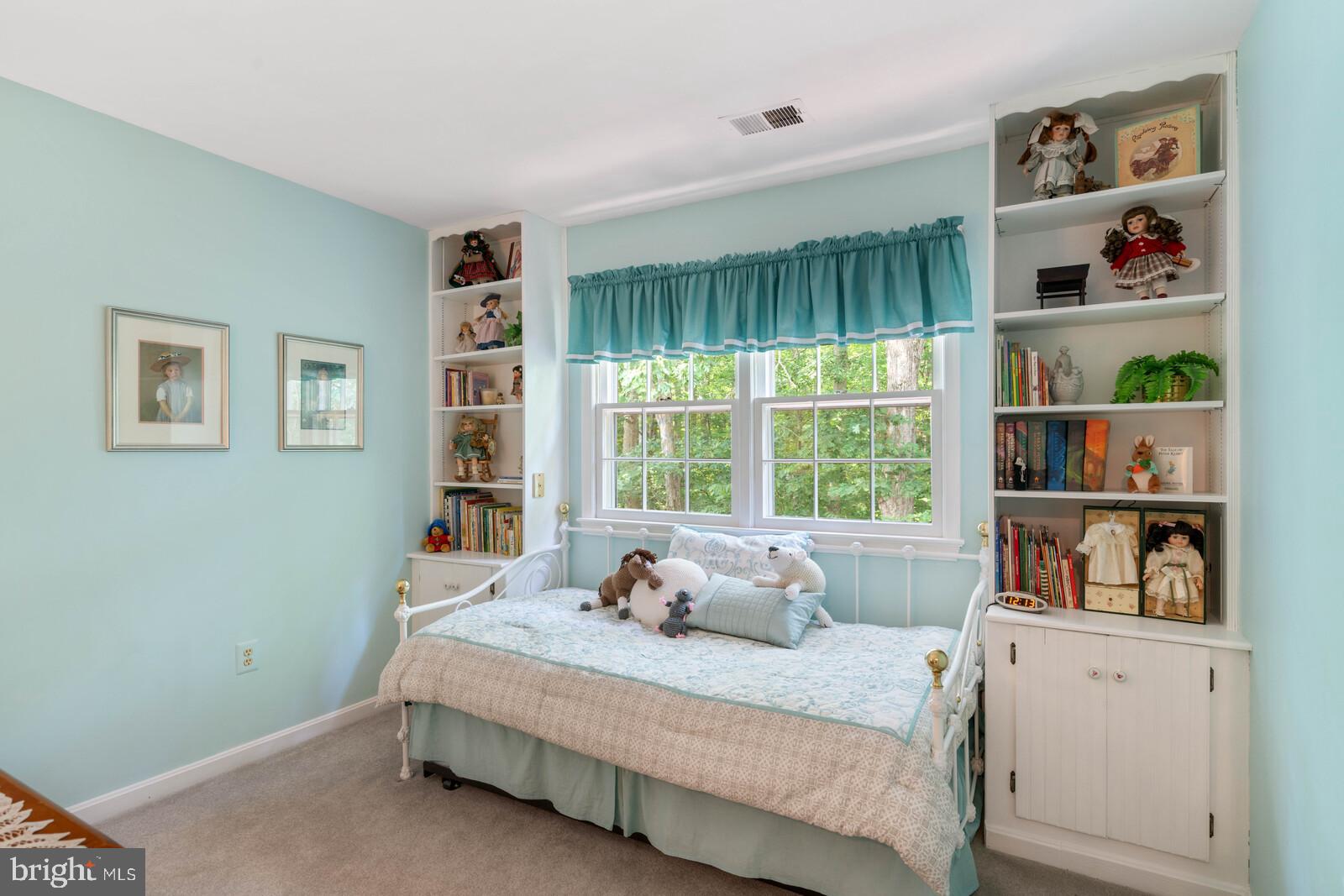 7788 Turlock Road Springfield, VA 22153 - Photo 42 of 65 Fourth bedroom with built-in bookcases